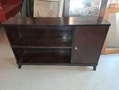 Pieni kirjahylly kaapilla 1950 lukua 
Mitat LxSxK 112x25x67 cm. Hinta 60e 